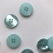 Blank lysebl knap 4-huls, 15 mm