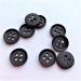 Sort mat knap, 4-huls, 15 mm